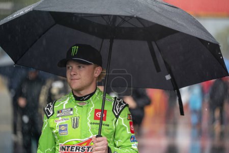 Photo for NASCAR Cup Driver, TY GIBBS (54) escapes the rain for the Inaugural Grant Park 220 on the Chicago Street Course in Chicago IL. - Royalty Free Image