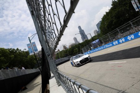 Photo for NASCAR Cup Driver, CHRIS BUESCHER (17) takes to the track to practice for the Inaugural Grant Park 220 on the Chicago Streeet Course in Chicago IL. - Royalty Free Image