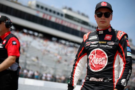 Photo for NASCAR Cup Driver, Christopher Bell (20) gets ready to qualify for the Crayon 301 at the New Hampshire Motor Speedway in Loudon NH. - Royalty Free Image