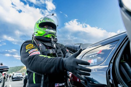 Photo for NHRA driver, Matt Hagan, prepares to qualify for the Dodge Power Brokers NHRA Mile-High Nationals in Morrison, CO, USA. - Royalty Free Image