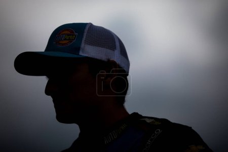 Photo for Lawless Alan suits up on pit road prior to the O'Reilly Auto Parts 150 at Mid-Ohio at the Mid-Ohio Sports Car Course in Lexington OH. - Royalty Free Image