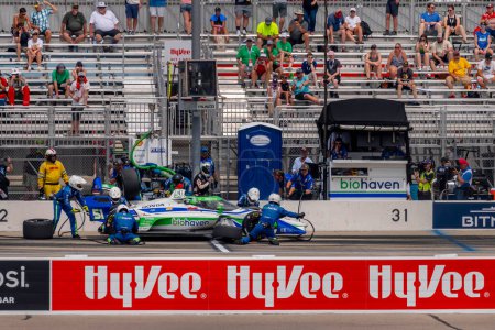 Photo for INDYCAR driver, STING RAY ROBB (R) (51) of Payette, Idaho, brings his car in for service during the Hy-Vee INDYCAR Race Weekend at Iowa Speedway in Newton IA. - Royalty Free Image