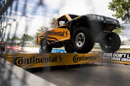 Photo for ROBBY GORDON (7) of Orange, CA drives on track during a practice session for the Big Machine Music City Grand Prix at The Streets of Nashville  in Nashville TN. - Royalty Free Image