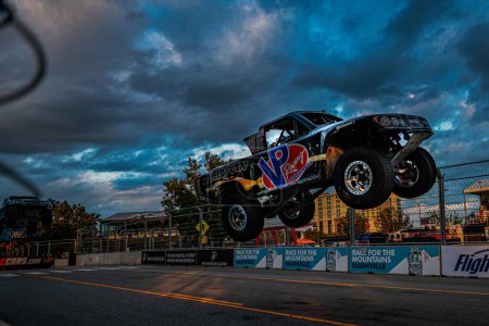 Photo for Stadium Super Trucks driver, GAVIN HARLIEN (1) of Newport Beach, CA, travels through the turns during a practice session for the Big Machine Music City Grand Prix on Streets of Nashville in Nashville TN. - Royalty Free Image