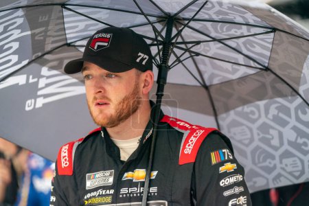 Photo for NASCAR Cup Series Driver, Ty Dillon (77) takes to the track after a rain delay for the FireKeppers 400 at the Michigan International Speedway in Brooklyn MI. - Royalty Free Image