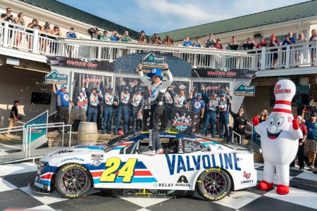 Photo for NASCAR Cup Driver, William Byron (24) celebrates his win for the Go Bowling at the Glen at the Watkins Glen International in Watkins Glen NY. - Royalty Free Image