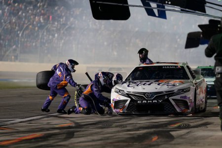 Photo for NASCAR Cup Driver, Denny Hamlin (11) races for position for the Coke Zero Sugar 400 at the Daytona International Speedway in Daytona  FL. - Royalty Free Image