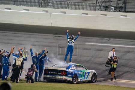 Photo for NASCAR Cup Driver, Chris Buescher (17) celebrates his win for the Coke Zero Sugar 400 at the Daytona International Speedway in Daytona  FL. - Royalty Free Image