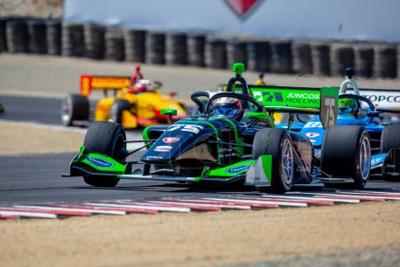 Photo for INDYCAR NXT by Firestone Series driver, VICTOR FRANZONNI (75) of Sao Paulo, Brazil, races through the turns during the Firestone Grand Prix of Monterey at the WeatherTech Raceway Laguna Seca in Monterey CA. - Royalty Free Image