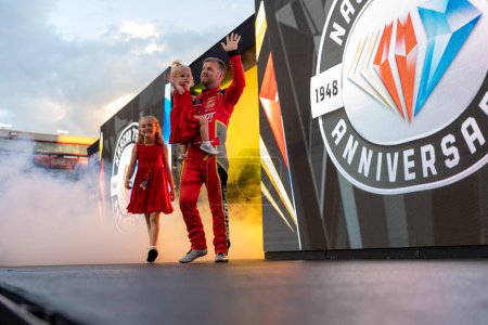 Photo for NASCAR Xfinity Series Driver Justin Allgaier (7) gets introduced for the Food City 300 at the Bristol Motor Speedway in Bristol TN. - Royalty Free Image