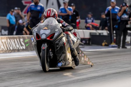 Photo for Sep 22, 2023-Concord, NC:  NHRA Pro Stock Motorcycles Series driver, Eddie Krawlec, runs down the lane during a qualifying session for the Betway Carolina Nationals. - Royalty Free Image