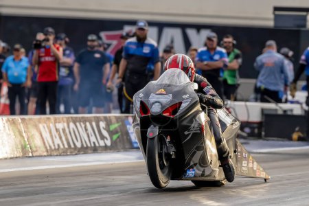 Photo for Sep 22, 2023-Concord, NC:  NHRA Pro Stock Motorcycles Series driver, Gaige Herrera, runs down the lane during a qualifying session for the Betway Carolina Nationals. - Royalty Free Image