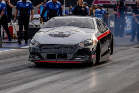 Photo for Sep 22, 2023-Concord, NC:  NHRA Pro Stock Series driver, Brandon Miller, runs down the lane during a qualifying session for the Betway Carolina Nationals. - Royalty Free Image