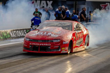 Photo for Sep 22, 2023-Concord, NC:  NHRA Pro Stock Series driver, Erica Enders, runs down the lane during a qualifying session for the Betway Carolina Nationals. - Royalty Free Image