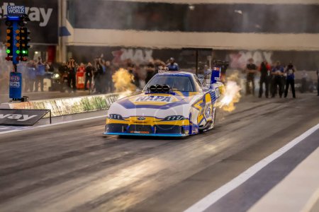 Photo for Sep 22, 2023-Concord, NC:  NHRA Funny Car Series driver, Ron Capps, runs down the lane during a qualifying session for the Betway Carolina Nationals. - Royalty Free Image