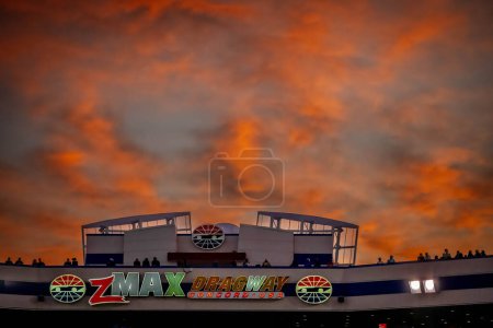 Photo for Sep 22, 2023-Concord, NC:  The sun sets on zMax Dragway as it plays host to the NHRA Series for the Betway Carolina Nationals. - Royalty Free Image