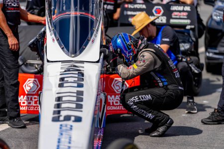Photo for Sep 24, 2023-Concord, NC:  NHRA Top Fuel Dragster Series driver, Antron Brown, prepares to make a run during the Betway Carolina Nationals. - Royalty Free Image