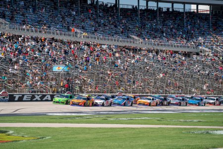 Photo for NASCAR Xfinity Series Driver Justin Allgaier (7) races for position for the Andy's Frozen Custard 300 at the Texas Motor Speedway in Fort Worth TX. - Royalty Free Image