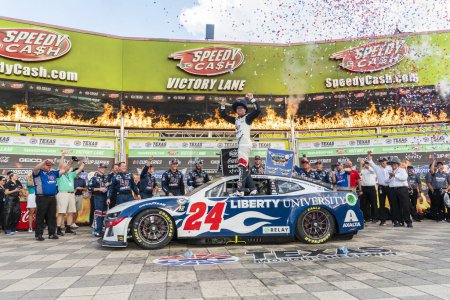 Photo for NASCAR Cup Series Driver William Byron (24) celebrates his win for the Autotrader EchoPark Automotive 400 at the Texas Motor Speedway in Fort Worth TX. - Royalty Free Image
