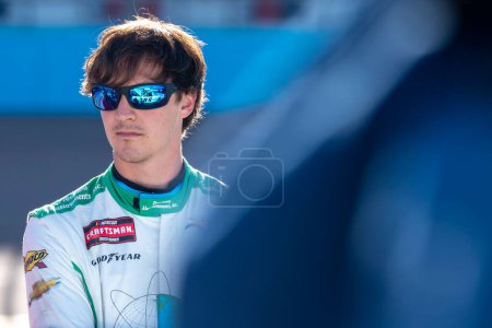 Photo for NASCAR Craftsman Truck Series Driver Nick Leitz (20) awaits for qualifying to begin for the Craftsman 150 at the Phoniex Raceway in Avondale AZ. - Royalty Free Image