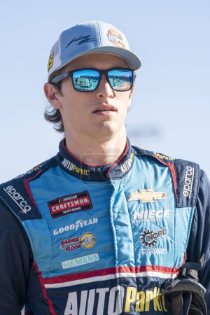 Photo for NASCAR Craftsman Truck Series Driver Lawless Allan (45) awaits for qualifying to begin for the Craftsman 150 at the Phoniex Raceway in Avondale AZ. - Royalty Free Image