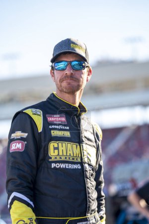 Photo for NASCAR Craftsman Truck Series Driver Grant Enfinger (23) awaits for qualifying to begin for the Craftsman 150 at the Phoniex Raceway in Avondale AZ. - Royalty Free Image