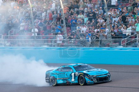 Photo for NASCAR Cup Series Driver Ross Chastain (1) celebrates his win for the NASCAR Cup Series Championship at the Phoniex Raceway in Avondale AZ. - Royalty Free Image