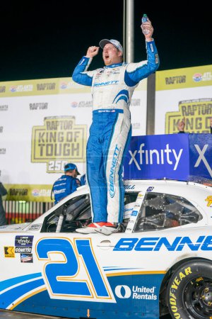 Photo for Austin Hill celebrates his win for the RAPTOR King of Tough 250 in Hampton, GA, USA - Royalty Free Image