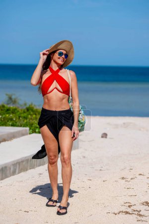 Stunning model embraces coastal bliss at Sinanche, Yucatan, near Gulf of Mexico beauty and nature intertwine on the sun-kissed shores