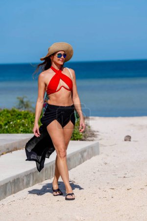 Stunning model embraces coastal bliss at Sinanche, Yucatan, near Gulf of Mexico beauty and nature intertwine on the sun-kissed shores