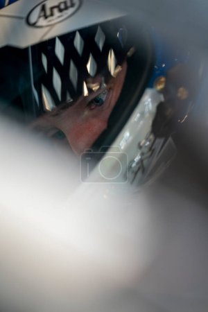 Photo for Derek Kraus waits for practice to begin for the Shiners Children's 500 in Avondale, AZ, USA - Royalty Free Image