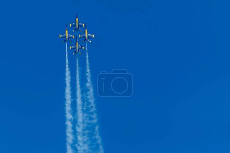 Photo for March 01, 2024-El Centro, CA:  Blue Angels rehearse precision aerobatics before season debut, showcasing skill and teamwork in high-flying maneuvers. - Royalty Free Image