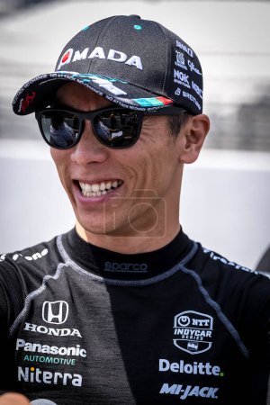 Photo for TAKUMA SATO (75) of Tokyo, Japan prepares to practice for the Indy 500 at the Indianapolis Motor Speedway in Speedway, IN. - Royalty Free Image