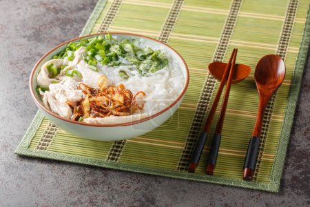 Photo for Vietnamese Chicken Glass Noodles Soup closeup on the bowl on the table. Horizonta - Royalty Free Image
