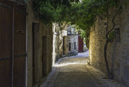 Foto de View through a typical French street in the village of Charlotte in the Dordogne - Imagen libre de derechos