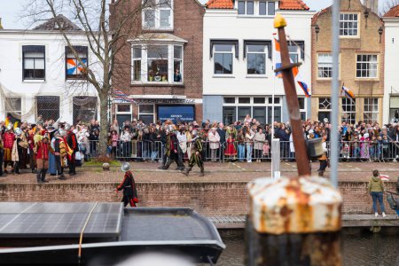 Photo for Brielle,Holland,1-04-2024:people in traditional traditional costumes celebration of the the first town to be liberated from the Spanish in Den Briel in the Netherlands in 1572 - Royalty Free Image