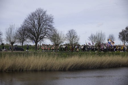 Photo for Brielle,Holland,1-04-2024:people in traditional traditional costumes celebration of the the first town to be liberated from the Spanish in Den Briel in the Netherlands in 1572 - Royalty Free Image