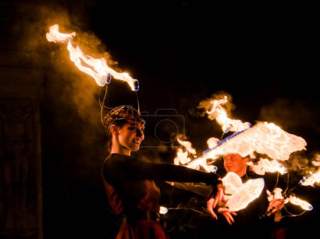 SZEGED, HUNGARY - OKTOBER 31. 2022: perfomance of the Fire Fantasy fire juggler group in Szeged Zoo
