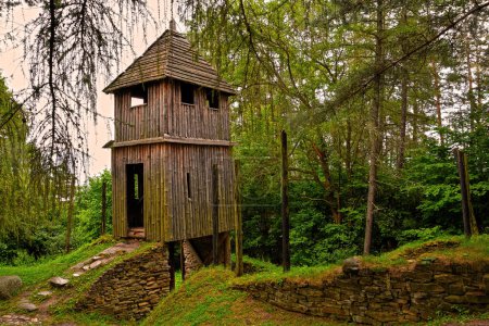 Photo for Celtic wooden tower near Liptovska Mara in Archaeological museum Havranok in Slovakia - Royalty Free Image