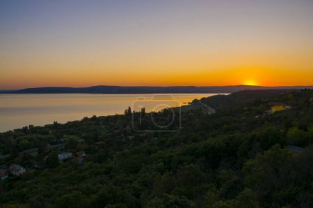 Photo for Sunset view of the Lake Balaton above Balatonkenese in Summer - Royalty Free Image