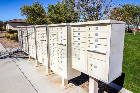 Photo for Row Of Multiple Mailboxes In Housing Subdivision - Royalty Free Image