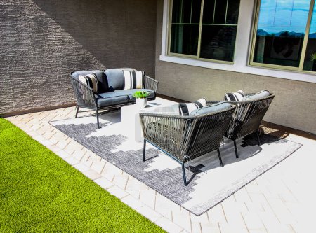 Photo for Back Patio With Chairs, Couch And Table - Royalty Free Image