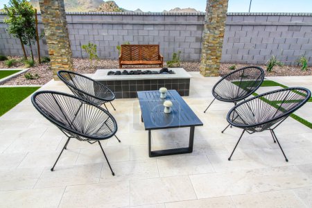 Photo for Back Yard Patio With Raised Tile Fire Pit - Royalty Free Image