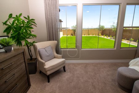 Photo for Master Bedroom Queen Anne Chair And Window View - Royalty Free Image