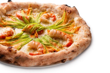 Foto de Closeup view of seafood pizza on white table - Imagen libre de derechos
