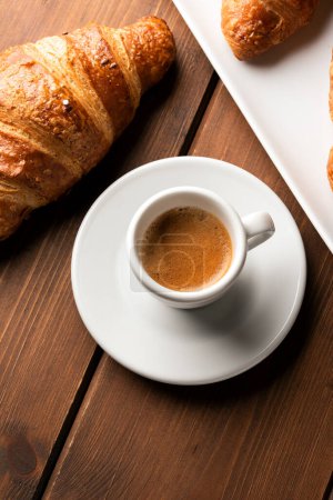 Photo for Cup of italian espresso with brioches - Royalty Free Image