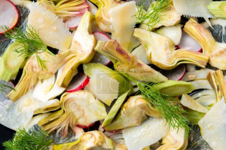 Photo for Delicious salad with artichokes and parmesan cheese - Royalty Free Image