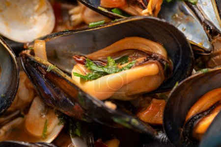 Photo for Typical italian Mussel and clam soup - Royalty Free Image