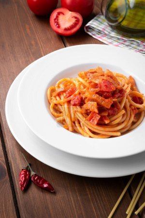 Photo for Closeup of italian spaghetti with tomato sauce and cheese, european food - Royalty Free Image