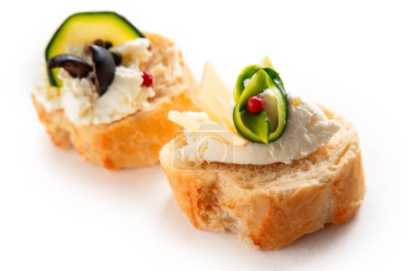 Photo for Closeup of delicious canapes topped with cheese cream - Royalty Free Image